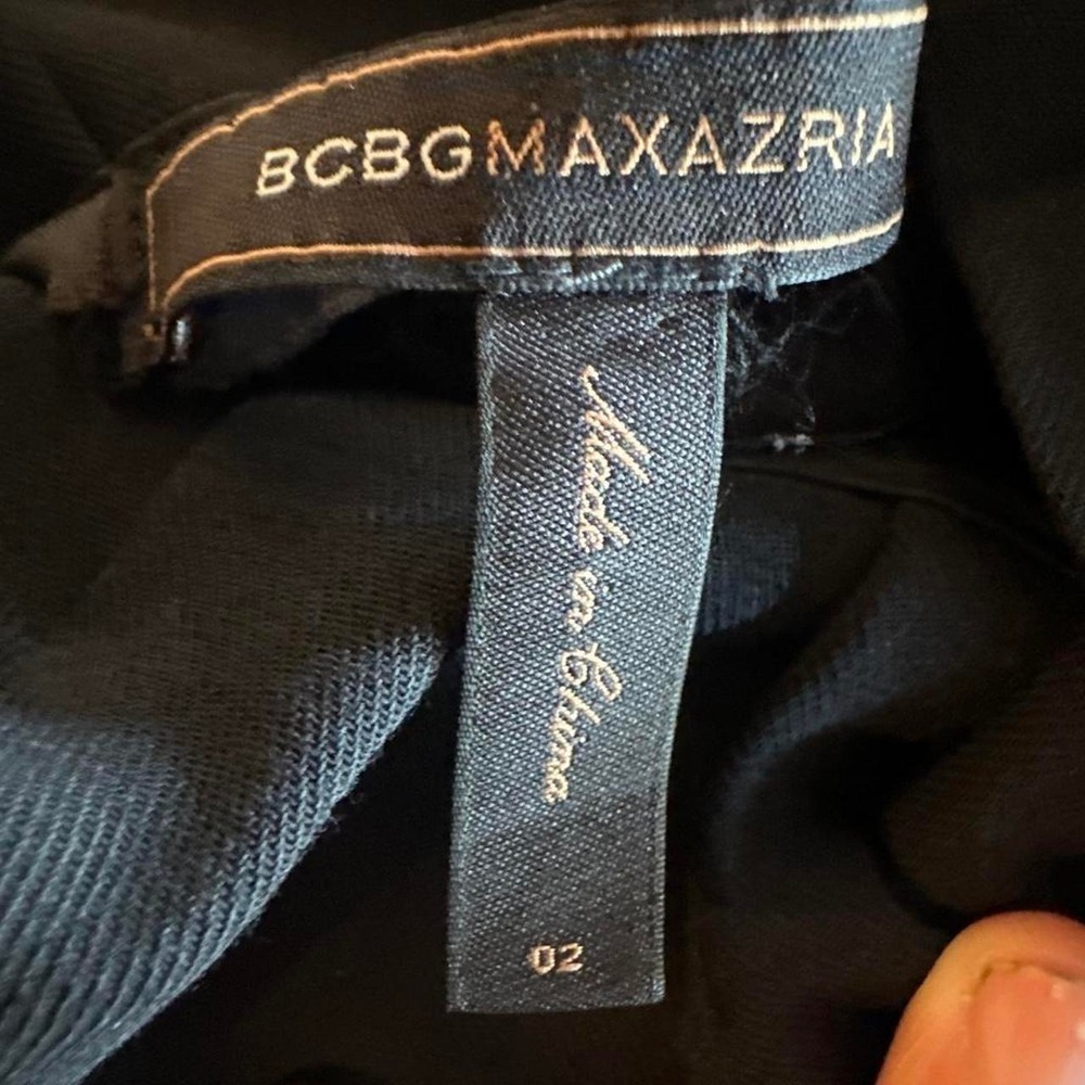 BCBGMAXAZRIA black high waisted pleated skirt size 02 someone cut the lining Out